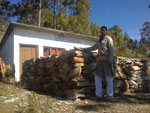 Himalayan village of Budhna 2015 - School principal with stone materials and existing school (click image to enlarge)